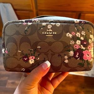 Coach make up bag or can be used for a clutch